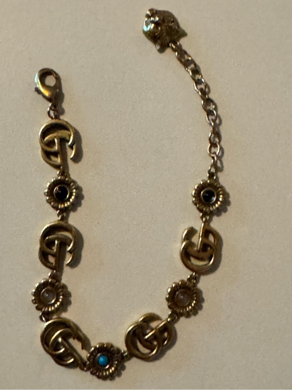 GUCCI Gold-Tone Floral Link Bracelet with Turquoise & Black Accents
